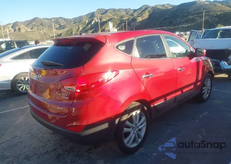 2010 Hyundai Tucson Limited z USA, uszkodzony, nr VIN KM8JUCAC9AU024189